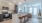a kitchen with a bar stool and a table