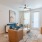 a living room with a ceiling fan