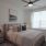 bedroom with bed and large window