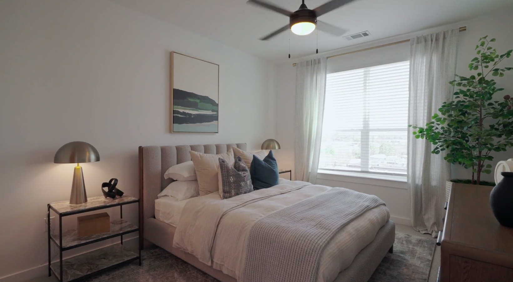 bedroom with bed and large window