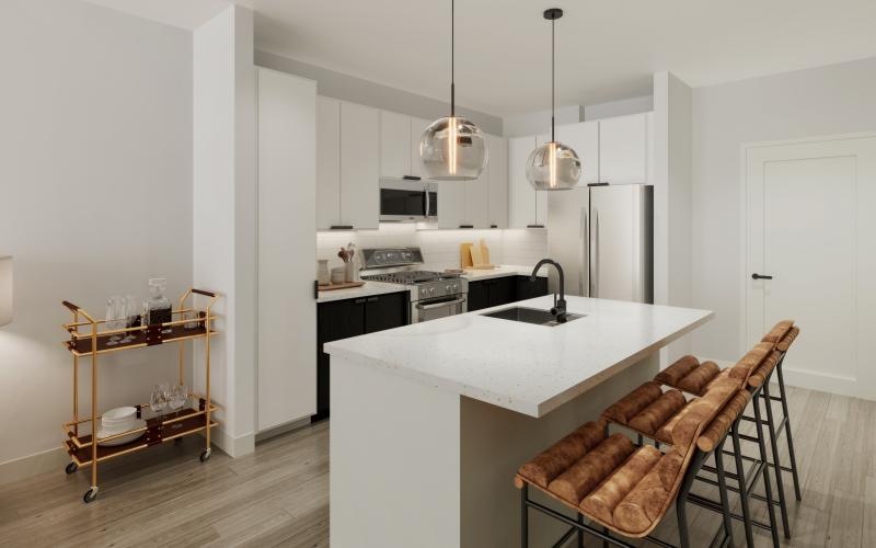 a kitchen with a white island